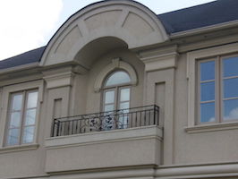 Custom windows with shaped transom and grills