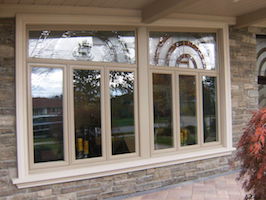 Window with custom glass design on transom